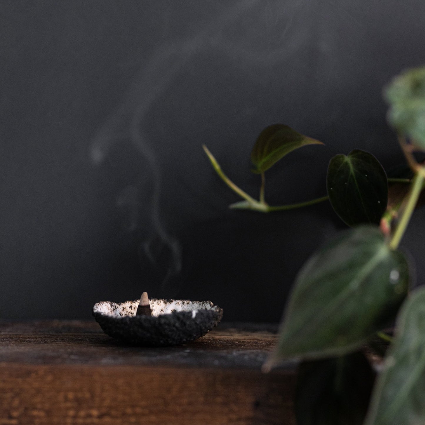 Incense burning in ceramic dish